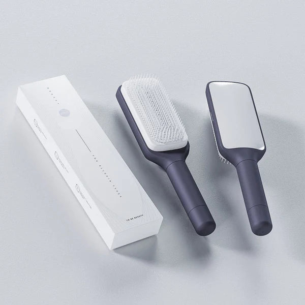 Automatic Cleaning Rotating Lifting Comb(50% OFF)